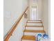 Stairway with wood steps and railing, leading to upper level at 5612 N Kings Hwy., Myrtle Beach, SC 29577
