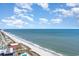 Breathtaking aerial view of the expansive ocean and sandy beach at 5905 S Kings Hwy. # 344B, Myrtle Beach, SC 29575
