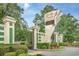 The entrance to Myrtle Beach Resort features a decorative gate and lush landscaping at 5905 S Kings Hwy. # 344B, Myrtle Beach, SC 29575