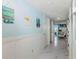 Hallway with beach-themed decor and access to a balcony with a view at 5905 S Kings Hwy. # 344B, Myrtle Beach, SC 29575