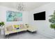 Stylish living room with a TV and an elegant light fixture at 5905 S Kings Hwy. # 344B, Myrtle Beach, SC 29575