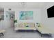 Bright living room features modern lighting, stylish furniture, and decorative wall art at 5905 S Kings Hwy. # 344B, Myrtle Beach, SC 29575