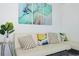 Cozy living room featuring a sofa, stylish pillows, and elegant decor at 5905 S Kings Hwy. # 344B, Myrtle Beach, SC 29575