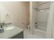 Bright bathroom featuring a shower-tub combo, stylish vanity, and neutral color palette, creating a serene atmosphere at 616 Edgecreek Dr., Myrtle Beach, SC 29579