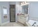Bathroom featuring tile floors, a jacuzzi tub, walk-in shower, and a granite vanity at 616 Edgecreek Dr., Myrtle Beach, SC 29579