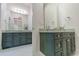 Bathroom featuring double sinks with lots of storage and a large mirror at 616 Edgecreek Dr., Myrtle Beach, SC 29579