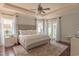 Spacious main bedroom boasts tray ceilings, an area rug and access to a private balcony at 616 Edgecreek Dr., Myrtle Beach, SC 29579