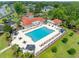 Aerial view of the community pool area with lounge chairs and umbrellas at 616 Edgecreek Dr., Myrtle Beach, SC 29579