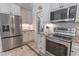 A kitchen featuring stainless steel appliances, granite countertops, and updated white cabinets at 616 Edgecreek Dr., Myrtle Beach, SC 29579