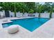 Private pool surrounded by lush landscaping, providing a serene and secluded retreat at 616 Edgecreek Dr., Myrtle Beach, SC 29579