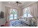 Cozy sitting room with plush seating, French doors leading to the pool, and ample natural light at 616 Edgecreek Dr., Myrtle Beach, SC 29579