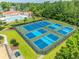 Aerial view of tennis and pickleball courts in a beautiful community at 616 Edgecreek Dr., Myrtle Beach, SC 29579