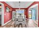 Charming dining area with stylish decor, seamlessly connecting to the entryway at 732 American Beech St., Loris, SC 29569