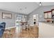 Cozy dining area with vaulted ceiling, seamlessly connecting to the kitchen and the rest of the home at 732 American Beech St., Loris, SC 29569