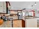 Charming kitchen features stainless steel appliances, tile floors, and beautiful countertops at 732 American Beech St., Loris, SC 29569