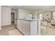 Modern kitchen featuring a granite island with breakfast bar, open to the living area at 7382 Meadow Walk Loop, Loris, SC 29569