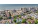 Elevated view of a coastal city with vibrant buildings and lush greenery, with the ocean in the distance at 7403 N Ocean Blvd. # C, Myrtle Beach, SC 29572