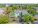 An aerial view of light blue townhomes featuring lush landscaping and convenient parking at 7403 N Ocean Blvd. # C, Myrtle Beach, SC 29572