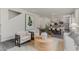 Open concept living room showcases dining area and contemporary decor at 7431 Meadow Walk Loop, Loris, SC 29569