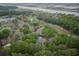 Picturesque aerial view of a complex surrounded by lush greenery and waterfront scenery at 802 Colony Pl. # 2E, Calabash, NC 28468