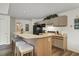 Kitchen offering a breakfast bar with seating, modern appliances, and lots of cabinet space at 802 Colony Pl. # 2E, Calabash, NC 28468