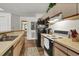 Traditional-style kitchen featuring stainless steel appliances and ample counter space at 802 Colony Pl. # 2E, Calabash, NC 28468