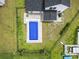 Aerial view of a home showcasing the private pool, fenced yard, and outdoor living space at 863 Agostino Dr., Myrtle Beach, SC 29579