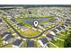 Aerial view of neighborhood with pond and beautiful single Gathering homes at 863 Agostino Dr., Myrtle Beach, SC 29579