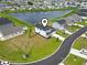 Aerial view of a well-manicured property with a large yard at 863 Agostino Dr., Myrtle Beach, SC 29579