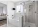 Bathroom featuring a shower, bathtub, and window at 863 Agostino Dr., Myrtle Beach, SC 29579