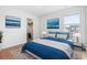 Beautiful bedroom boasts contemporary decor, a walk-in closet and a large window offering lots of natural light at 863 Agostino Dr., Myrtle Beach, SC 29579