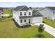 Aerial view showcases beautiful two-story home with well-maintained landscaping at 863 Agostino Dr., Myrtle Beach, SC 29579