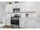 Modern kitchen with stainless steel appliances, stylish backsplash, and ample cabinet space at 863 Agostino Dr., Myrtle Beach, SC 29579