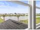 Beautiful view of the pond from the window, showing the neighborhood with a fountain in the water at 863 Agostino Dr., Myrtle Beach, SC 29579
