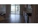 Modern kitchen featuring sleek stainless steel appliances, granite countertops, and stylish cabinetry at 8715 Baton Rouge Ave Nw, Calabash, NC 28467