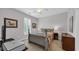 Traditional bedroom featuring a cozy bed with patterned bedding and shuttered windows at 959 Hendrick Ave. # 0, Myrtle Beach, SC 29577