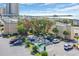 Aerial view of condominium near beach with parking, landscaping at 9661 Shore Dr. # A1, Myrtle Beach, SC 29572