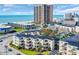 Coastal condos featuring balconies, lush landscaping, and ocean views in a vibrant community at 9661 Shore Dr. # A1, Myrtle Beach, SC 29572