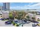 Exterior view of condo building with convenient parking, mature trees, and coastal charm at 9661 Shore Dr. # A1, Myrtle Beach, SC 29572