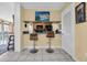 Efficient kitchen area featuring granite countertops and convenient breakfast bar seating at 9661 Shore Dr. # A1, Myrtle Beach, SC 29572