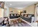 Comfortable living area showcasing tile flooring, cozy sofas, and bright natural light at 9661 Shore Dr. # A1, Myrtle Beach, SC 29572