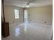 Inviting living room with tile flooring, a ceiling fan, and neutral walls at 1002 S Beech Ave., Andrews, SC 29510