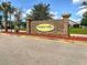 Attractive brick community sign welcomes you to Midtown Village, under a blue sky at 1033 Mccall Loop, Conway, SC 29526
