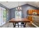 Open-concept dining room adjacent to the kitchen with access to the exterior at 1033 Mccall Loop, Conway, SC 29526
