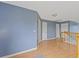 Upstairs hallway with wood-look floors and white doors offers a bright and spacious feel at 1033 Mccall Loop, Conway, SC 29526