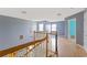 Hallway with wood floors leads to various rooms, offering great light and connectivity at 1033 Mccall Loop, Conway, SC 29526