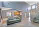 Open-concept living room adjacent to the kitchen with access to the staircase and dining area at 1033 Mccall Loop, Conway, SC 29526