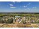 Aerial view of neighborhood with tree coverage around the home at 104 Clovis Circle, Myrtle Beach, SC 29579