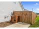 Backyard access gate to the front of the house. With wood fence at 104 Clovis Circle, Myrtle Beach, SC 29579