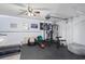 Basement features an open gym space with workout equipment, rubber floors and light colored walls at 104 Clovis Circle, Myrtle Beach, SC 29579